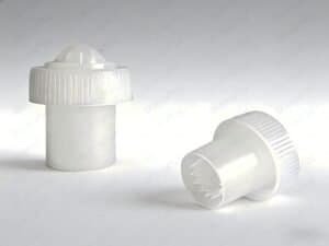 Caps for press-to-activate systems, showcasing durable and customizable designs for various industrial applications.