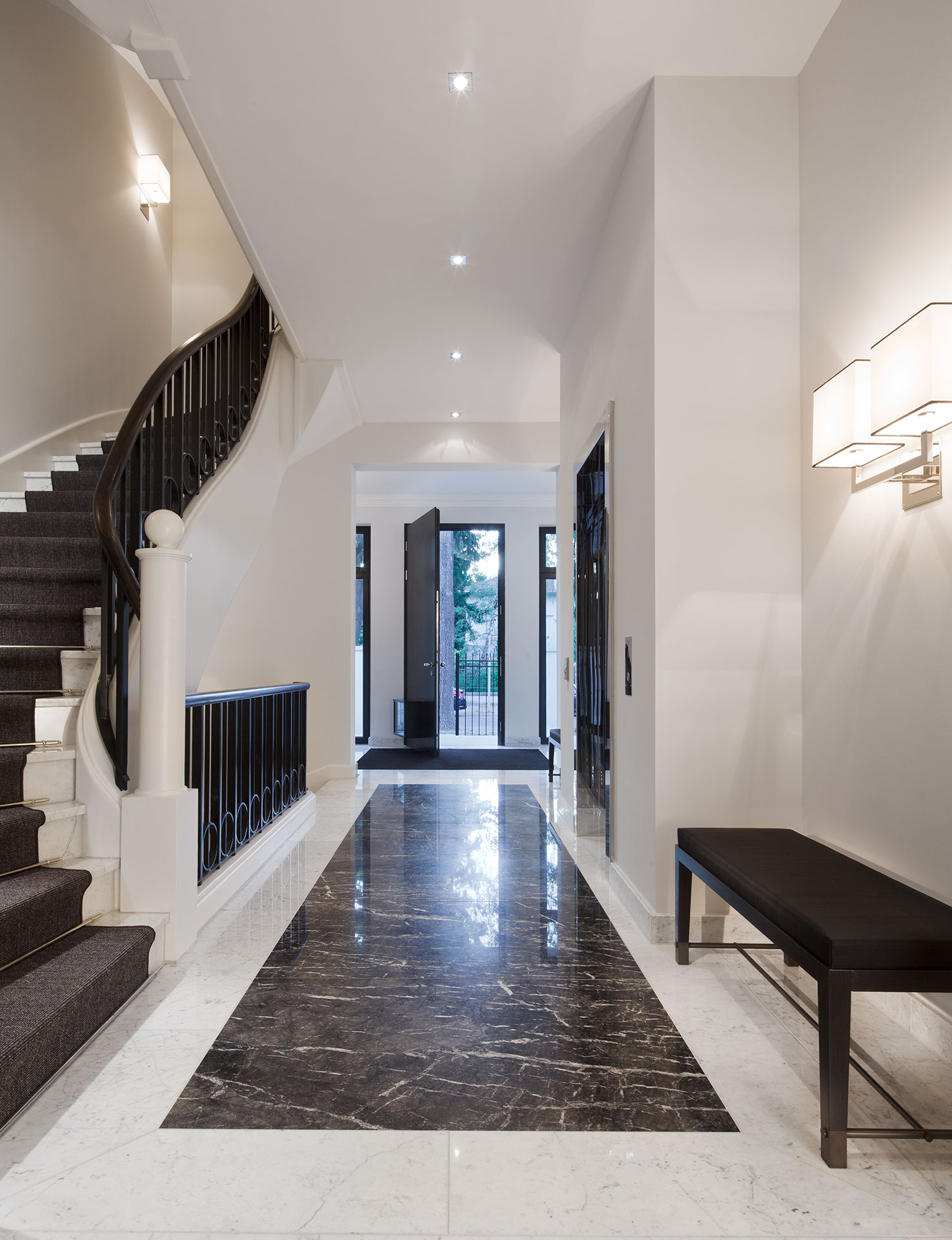 Interior staircase entrance hall with marble floor