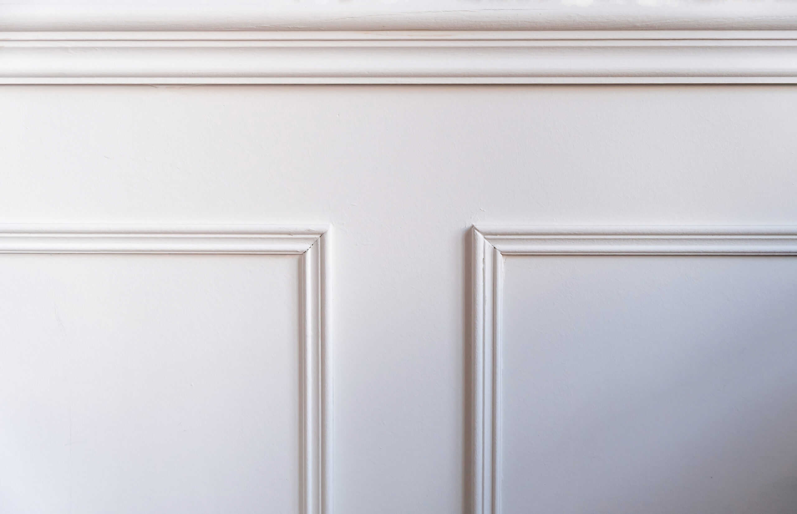 Classic wainscoting wall design detail in renovated interior