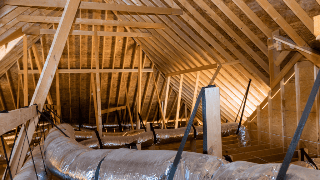 Attic inspection during roofing maintenance