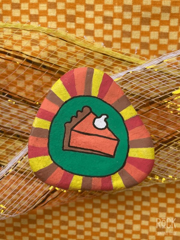 5 Easy Thanksgiving Rock Painting Ideas Kids and Adults Will Love 6 PUMPKIN PIE PAINTED ROCK