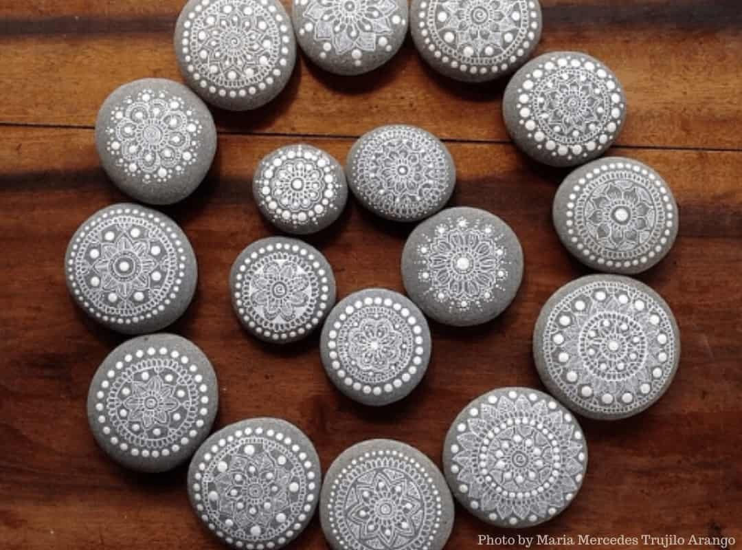 Creative Ways to Paint Mandalas with Maria Mercedes Trujillo 4 white painted mandalas on stones