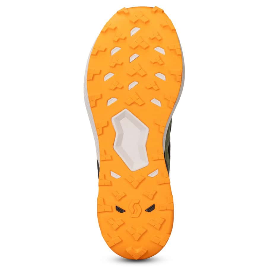 Flexible trail running shoe outsole with durable rubber grip for enhanced traction on uneven terrain. Ideal for trail runners seeking comfort and stability during outdoor runs.