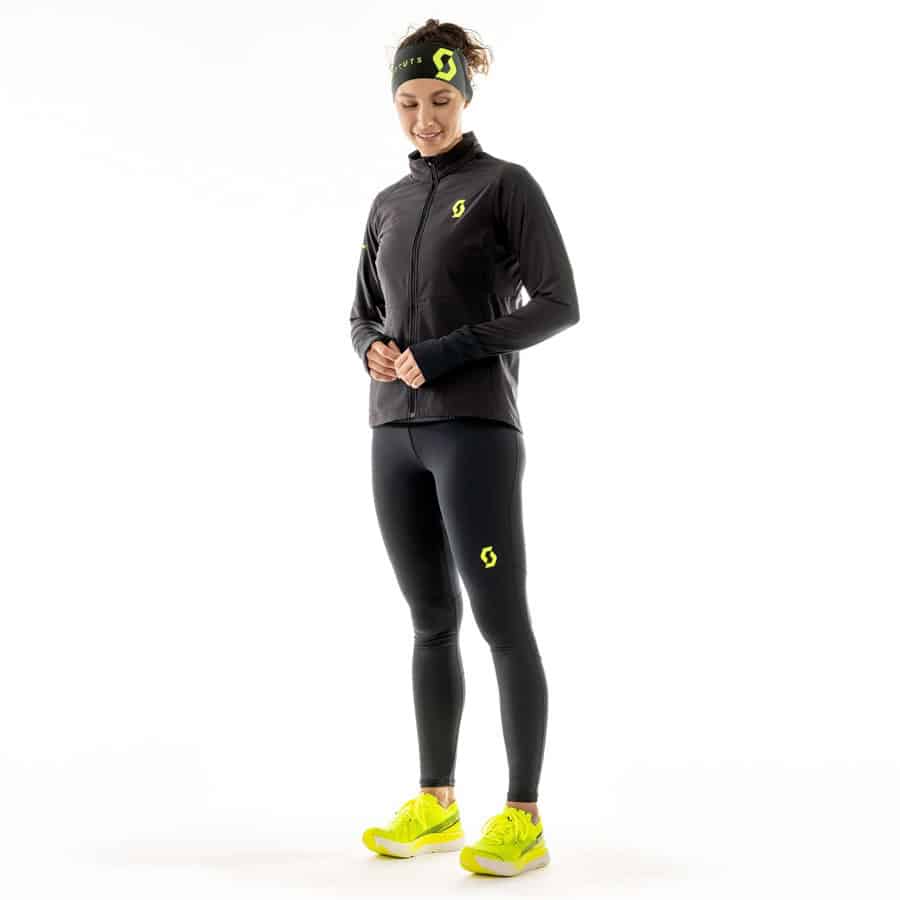 Running Insights athletic women's running apparel set with black and neon yellow features, ideal for performance and comfort in training and races.