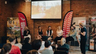 Engaging panel discussion at a running event, promoting marathon training, running tips, and athletic performance insights for passionate runners and enthusiasts.