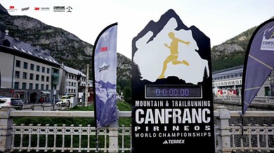 Running Insights logo and event signage at the CANFRANC Mountain & Trail Running World Championships in the Pyrenees, showcasing mountain trail running excellence and upcoming race insights.