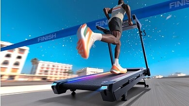 Speed running on UREVO Cyber Mega treadmill for marathon training at home.
