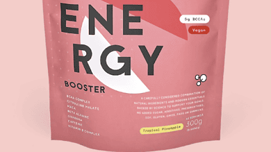 Pink Innermost Energy Booster vegan supplement pouch with BCAA, gluten-free, low sugar, and lactose-free, designed to support race preparation and recovery.