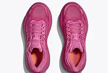 Pair of pink running shoes with breathable mesh upper and cushioned sole, ideal for running and athletic activities.