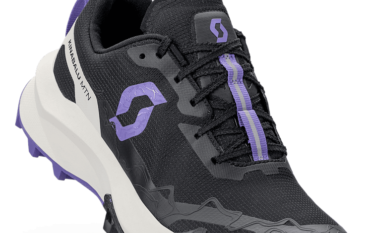 Close-up of Scott Kinabalu MTN women's trail running shoe with black, purple, and white design, showcasing durable sole and breathable upper material.