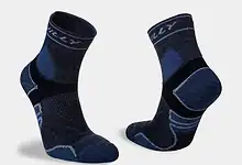 Pair of high-performance running socks in navy blue with cushioning and moisture-wicking features, ideal for runners seeking comfort and support during training.