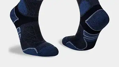 Pair of high-performance running socks in navy blue with cushioning and moisture-wicking features, ideal for runners seeking comfort and support during training.