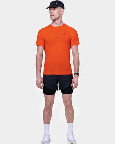 Men's orange running T-shirt from Ronhill, designed for comfort and performance during running sessions.