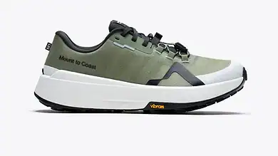 Green Mount to Coast running shoe with black and white accents, designed for trail running and outdoor activities.