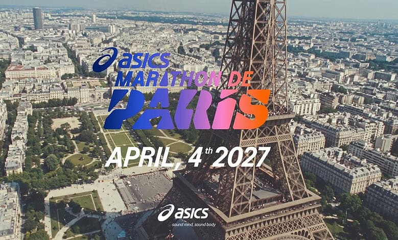 Aerial view of Paris with the Eiffel Tower and cityscape, promoting the ASICS Marathon de Paris on April 4th, 2027.