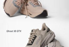 Pair of Brooks Ghost 18 GTX running shoes in beige and grey, showcasing their lightweight design and durable outsole, ideal for autumn running in wet conditions.
