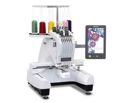 High-tech embroidery machine with multiple spools of thread and digital touchscreen interface for precise textile embroidery and design.