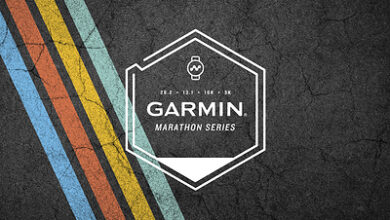 Garmin Marathon Series logo on a textured dark background with colorful stripes, promoting running events and marathon tracking technology.