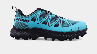 Blue INOV8 MUDTALON V2 women's trail running shoe with aggressive grip for muddy terrains.