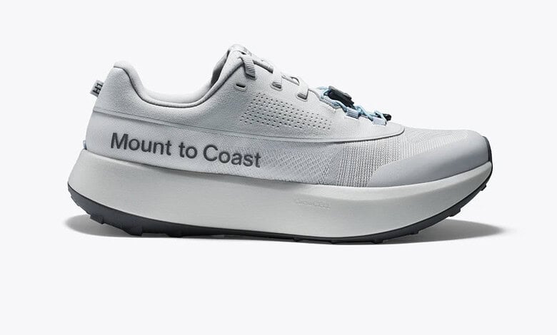 Light grey Mount to Coast running shoe with breathable mesh, cushioned midsole, and bold branding along the side.