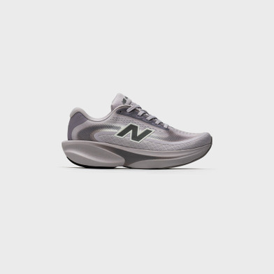 Light grey New Balance running shoe with cushioned sole and breathable mesh upper, ideal for running and athletic activities.