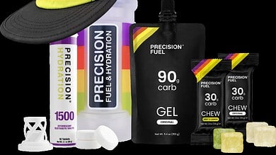 Running Insights sports nutrition and hydration products including gels, chews, and a cap for runners.