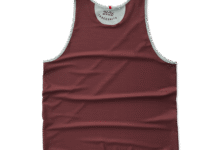 Maroon running vest with white trim, designed for track and field athletes, featuring the year 2026 and Tracksmith branding.