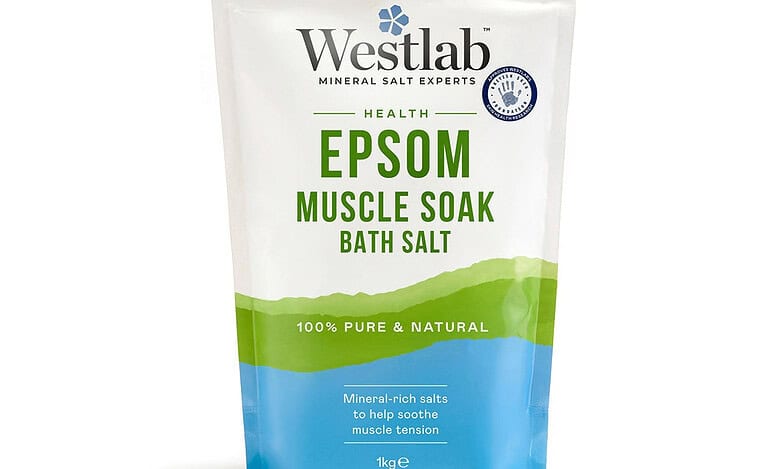 Westlab Epsom Muscle Soak Bath Salt pouch with blue bottom, white top, and green label indicating 100% pure and natural mineral-rich salts.