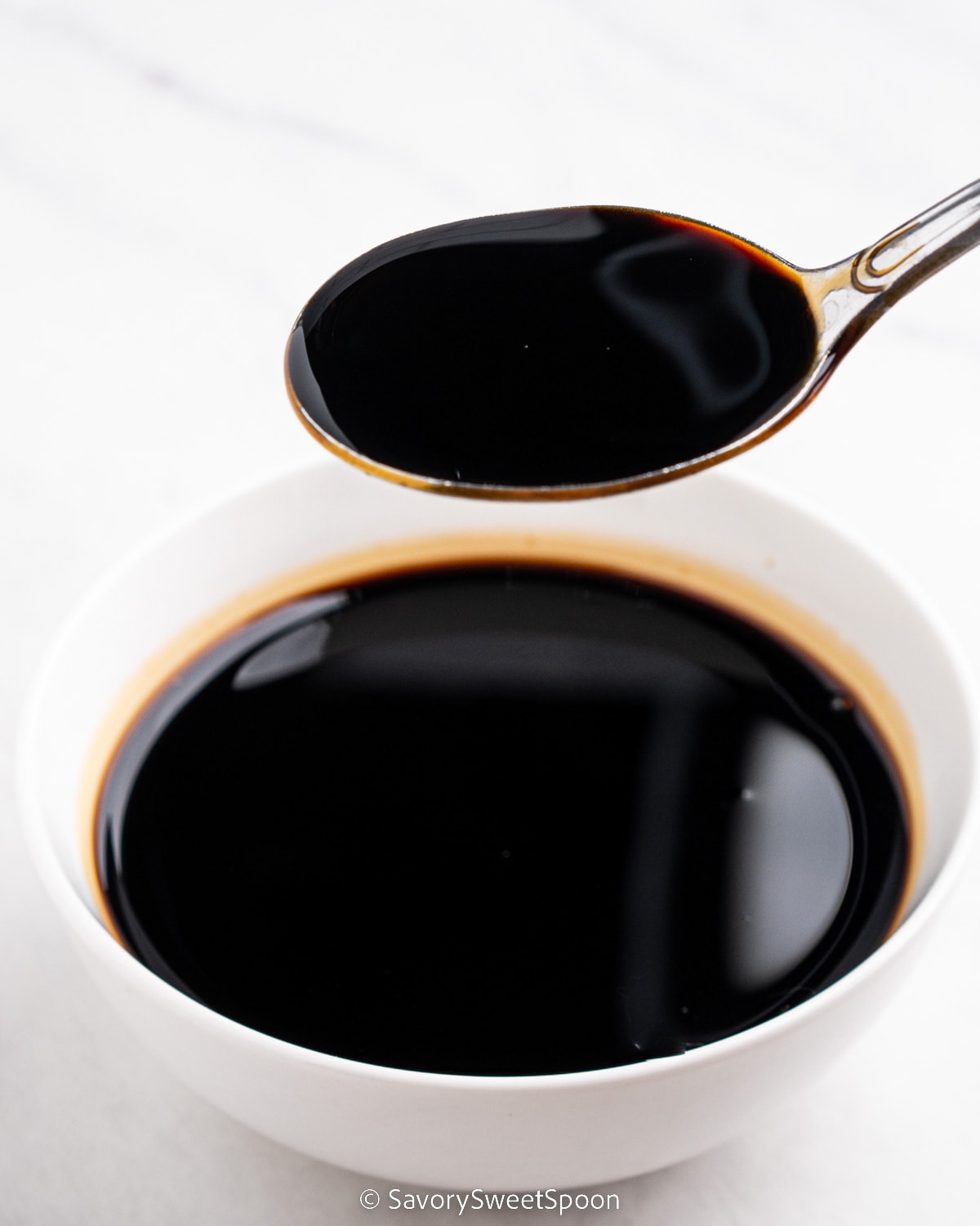Spoonful of dark soy sauce.