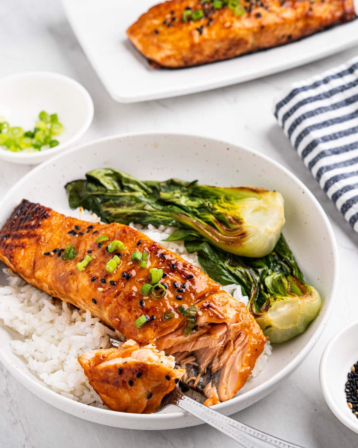 Plate of rice, bok choy and miso salmon.