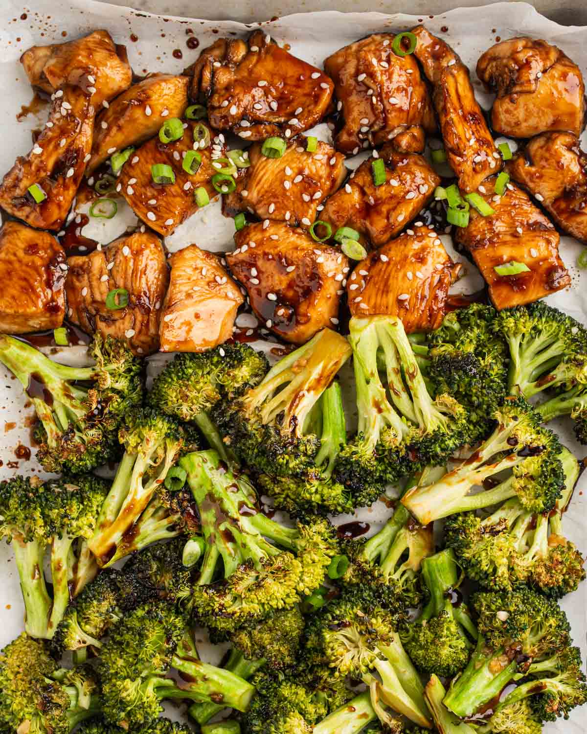teriyaki chicken and broccoli on a sheet pan.