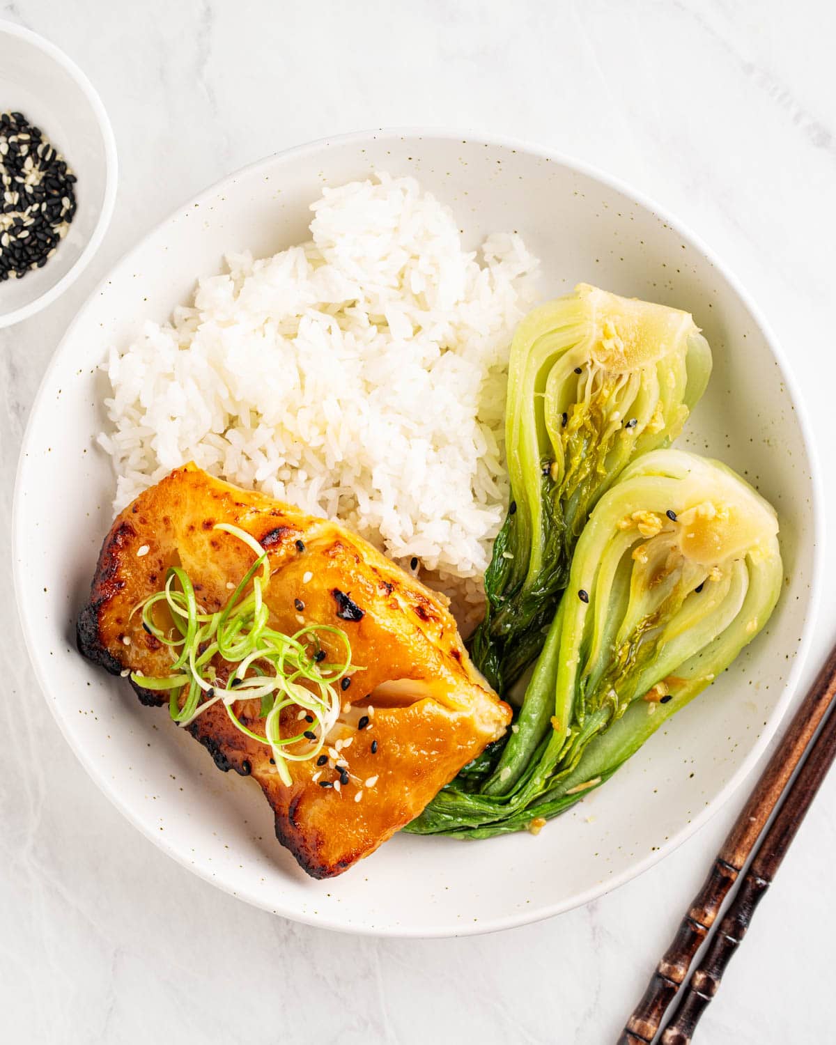 plate of baked miso cod over rice.