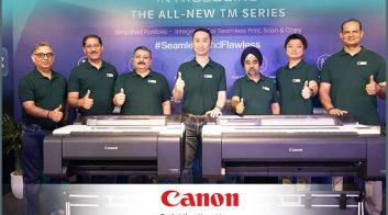 Group of people at Canon TM Series MFP launch event in India.
