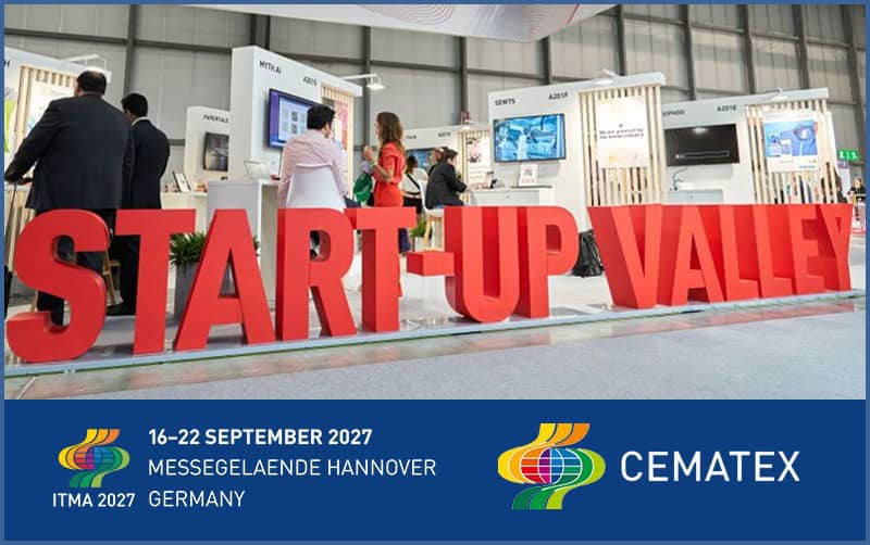 Start-Up Valley booth at ITMA 2027 with visitors and displays.