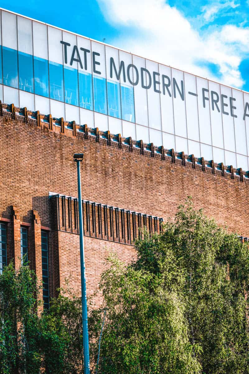 View of Tate Modern at London Bridge Village, near St Christopher's Inns, with cityscape and bluesky.