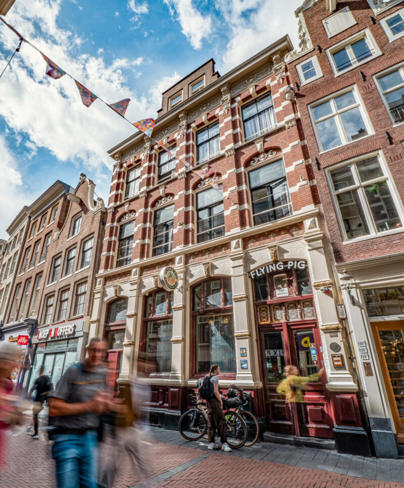 Historic building on a lively city street in London, featuring traditional architecture and vibrant.