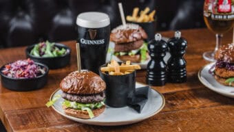 Delicious burgers, fries, and drinks at St Christopher's Pub.