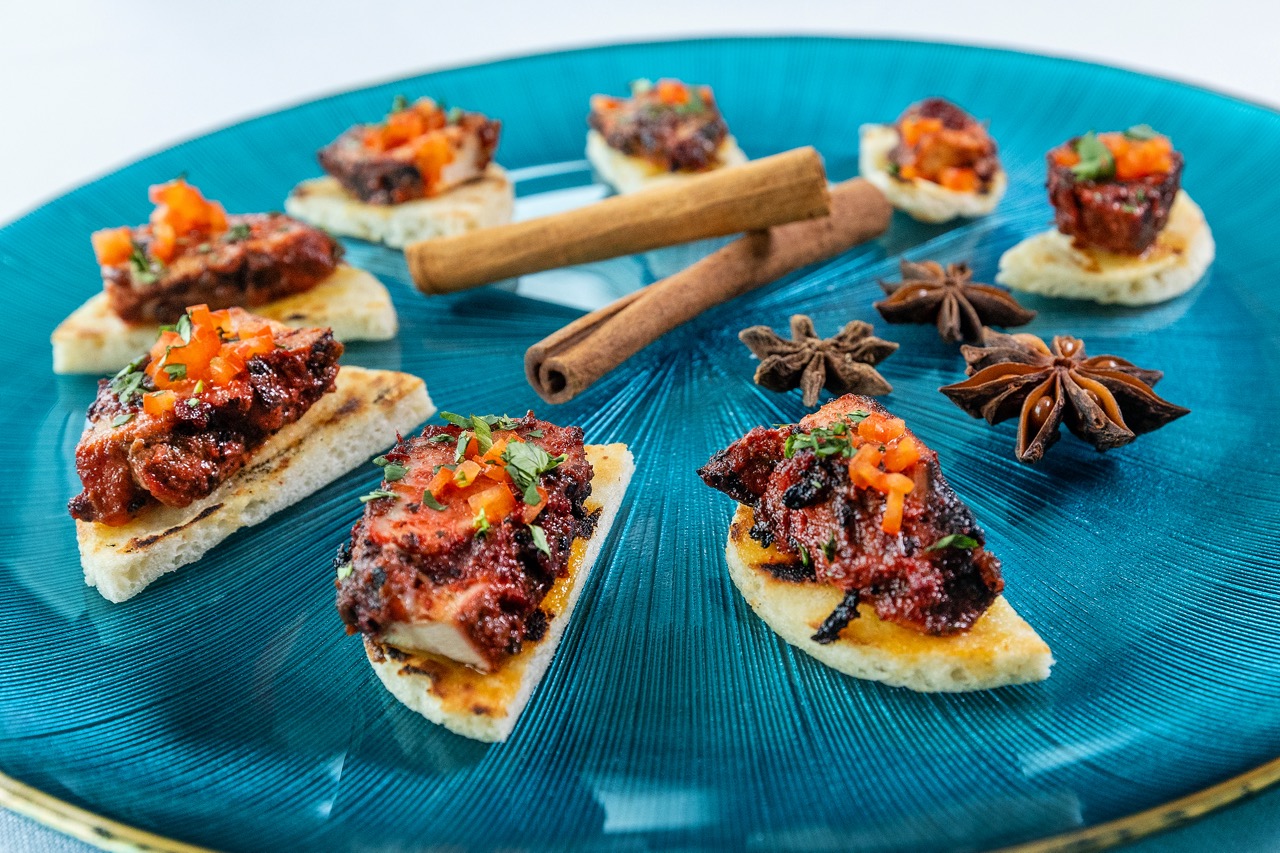 Tandoori chicken crostini appetizer served at a Candlewood Inn wedding reception.
