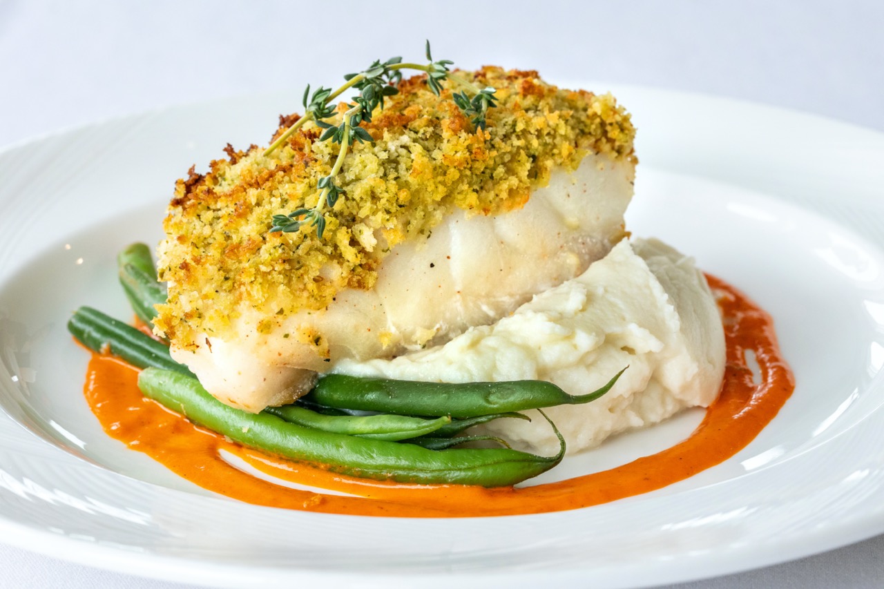 Herb roasted cod with mashed potatoes and green beans at a Candlewood Inn reception.