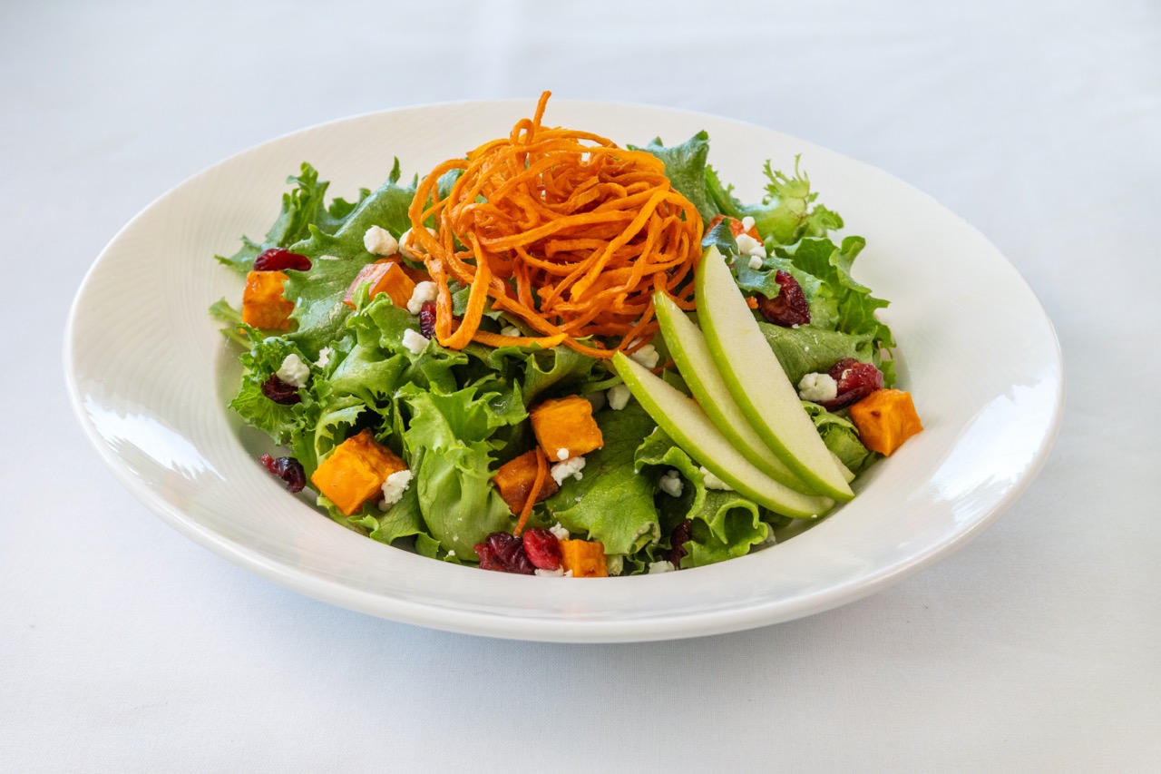 Harvest salad with apples, sweet potatoes, and cranberries served at Candlewood Inn.