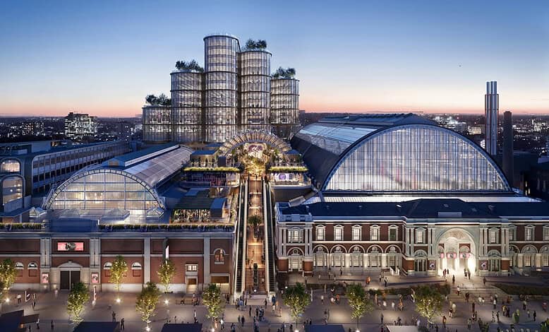 Elegant winter cityscape featuring a modern glass-roofed shopping centre with illuminated exteriors, showcasing contemporary architecture and vibrant urban life, ideal for winter trips and holiday shopping.