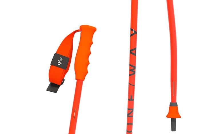 Alpine ski poles in bright orange with ergonomic grips and adjustable straps, perfect for winter sports enthusiasts seeking reliable equipment for skiing adventures.