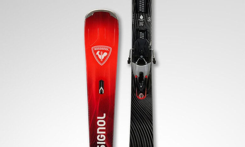 Pair of Rossignol Hero MT-Ti skis designed for advanced winter skiing, featuring a sleek black and red design with high-performance features for optimal snow traction.