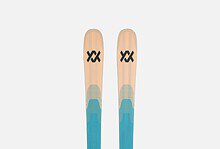 Pair of Volkl skis with blue and beige design, ideal for winter sports and skiing adventures.