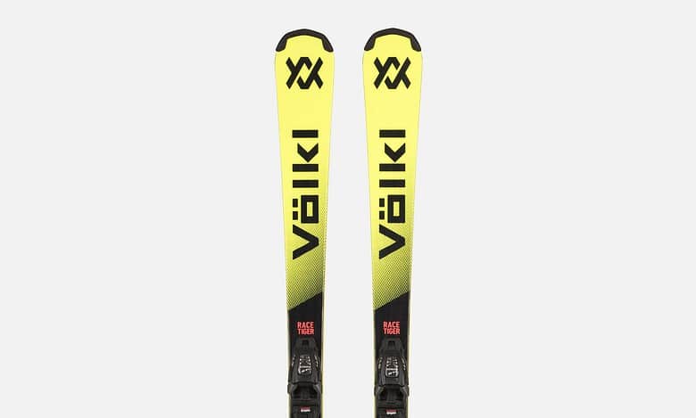 Pair of Völkl Junior Pro skis in yellow and black with bindings, designed for winter skiing enthusiasts.
