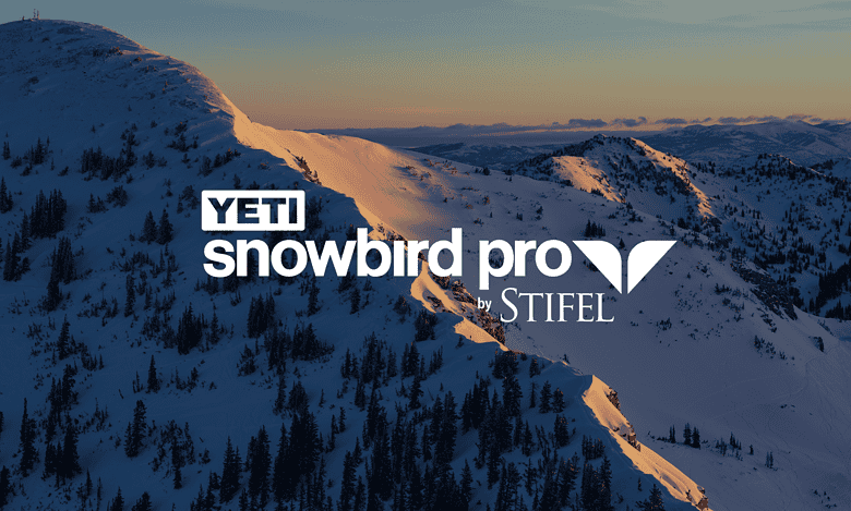 Snowy mountain landscape at dawn with YETI Snowbird Pro by STIFEL logo overlay, winter skiing scenery.