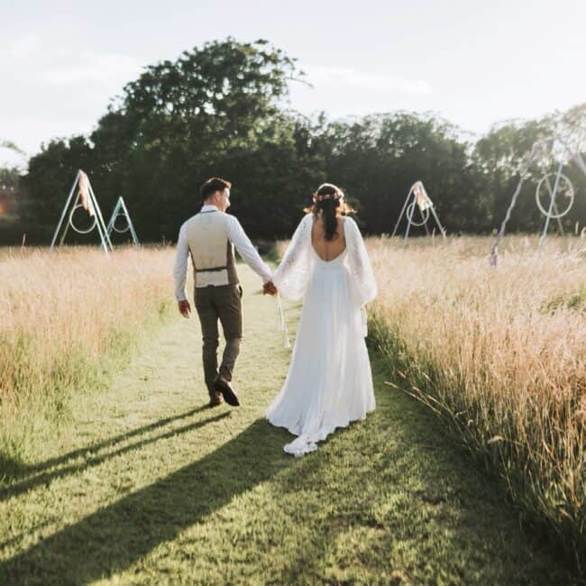 The Meadows Dereham wedding videographer capturing Jamie & Ben's outdoor festival wedding ceremony at The Meadows Norfolk