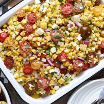 A grilled corn and tomato salad with feta.