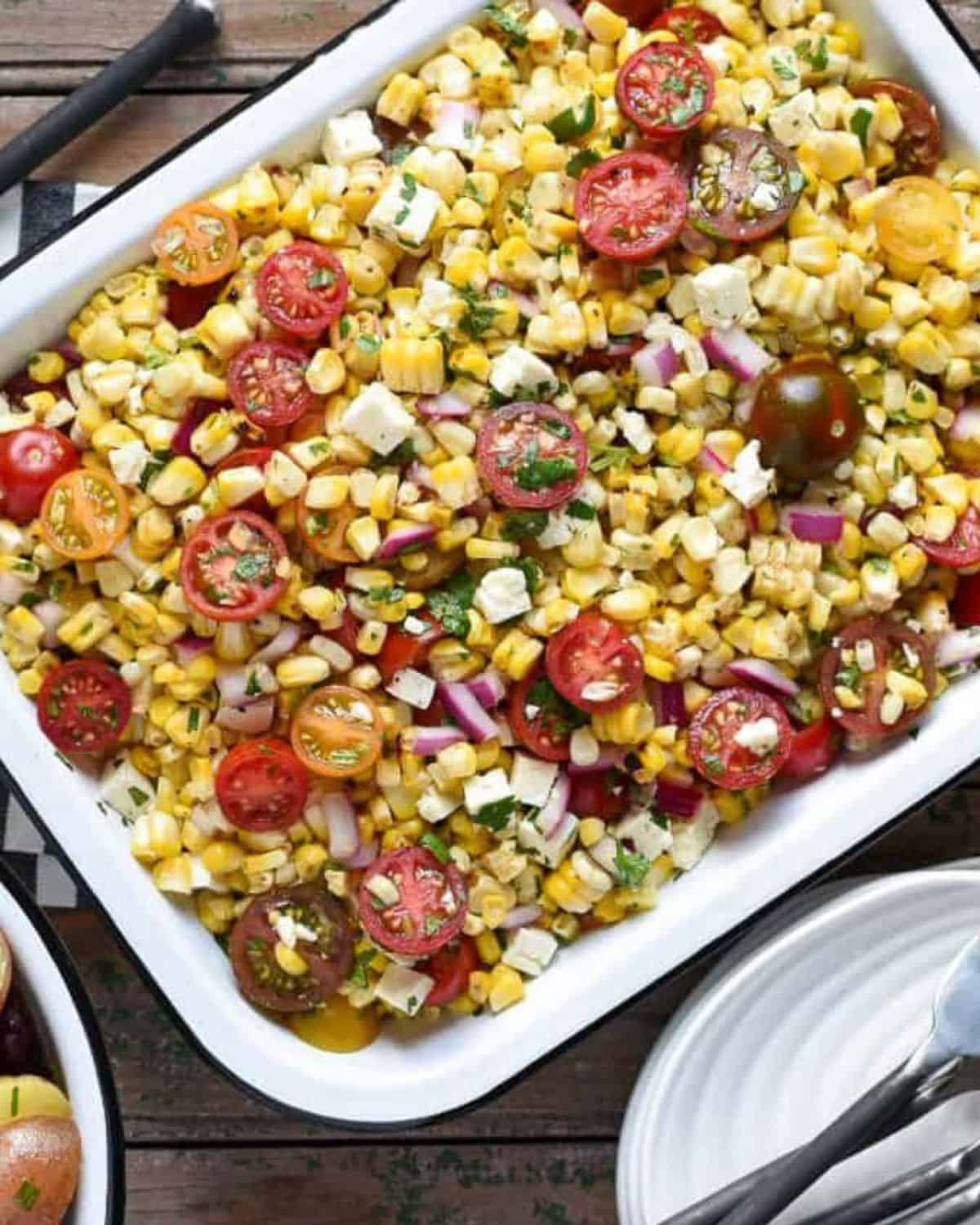 A grilled corn and tomato salad with feta.