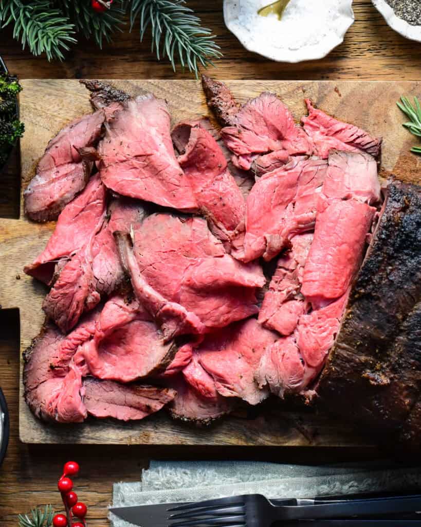 Slices of medium rare roast beef.